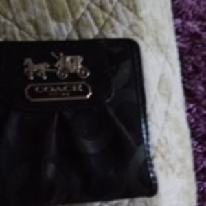 A coach wallet. Its small